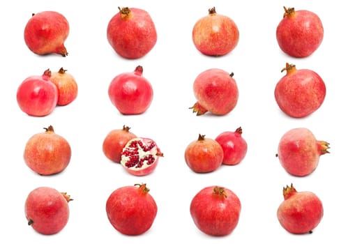 Collection of red pomegranates isolated on white background