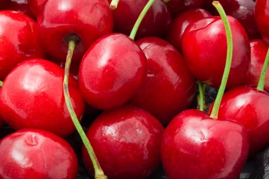 Beautiful red fresh cherry macro photo background