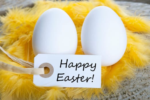 Easter Background with Two Eggs and Label with Happy Easter on it