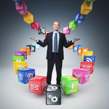 business man on abstract icons cubes