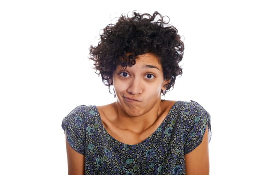 Portrait of confused and uncertain hispanic woman isolated on white background and looking at camera