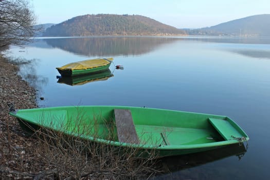 Two fishing boats on the shores of Lake Eder