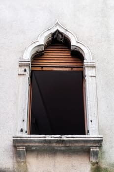 Detail of Venetian architecture. Typical window in Venice, Italy.