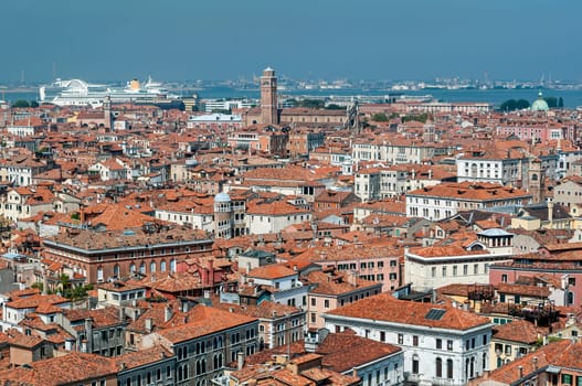 Cruise ship, buildings and houses in Venice, Italy.