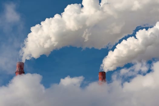 Industrial smoke rising from Power Station Cooling Towers
