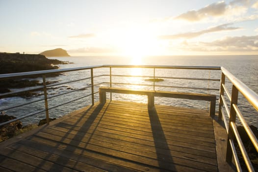 HDR Picture Sunrise on a Pier over Atlantic Ocean in Tenerife Canary Islands Spain
