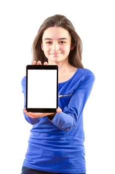 Happy teen girl shows digital tablet on white background. Focus on tablet pc.
