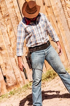 SOUTH WEST - A cowboy takes time to rest and reflect.