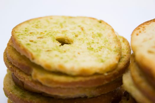 Healthy bruschettas baked with green herbs.