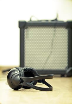 Headphones and guitar amplifier