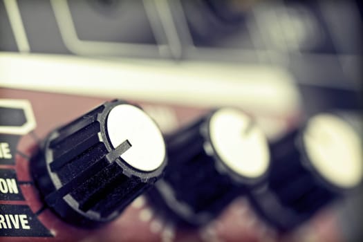 Close up on Guitar amplifier knobs
