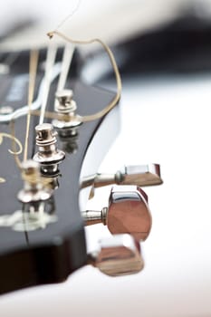Detail of electric guitar with shallow depth of field