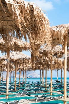 Umbrellas and sunbeds on Elafonissi beach, Crete,  Greece