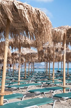 Umbrellas and sunbeds on Elafonissi beach, Crete,  Greece
