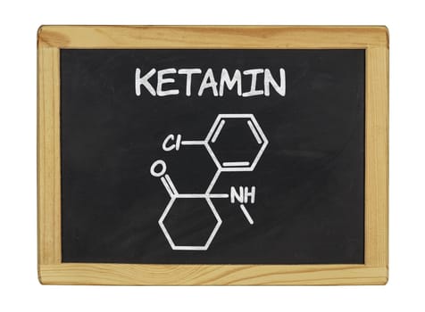 chemical structural formula of ketamine on a slate