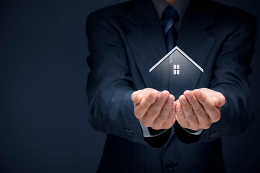 Real estate agent offer house. Property insurance and security concept.