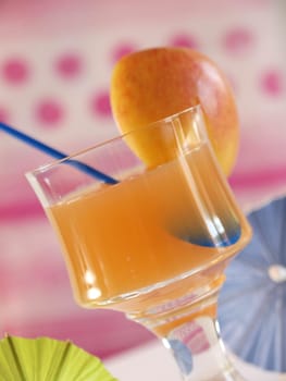 Tropical drink in a bar with colorful decoration