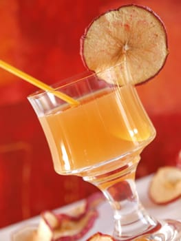 Tropical drink in a bar with colorful decoration
