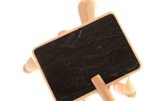 Wooden man holding a blackboard with space for text
