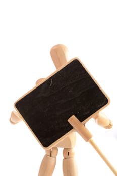 Wooden man holding a blackboard with space for text