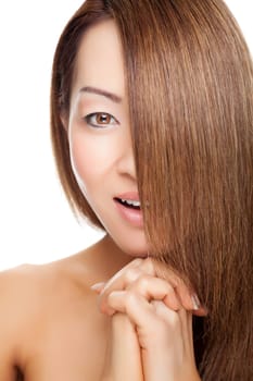 Beautiful young Thai woman with long elegant straight hair