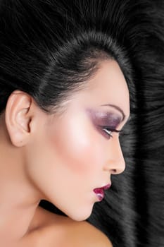 Beautiful young Thai woman with long elegant straight hair