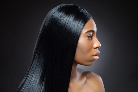 Beautiful young black woman with long straight hair