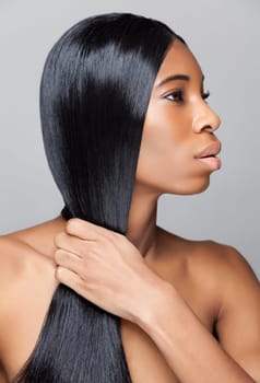 Beautiful young black woman with long straight hair