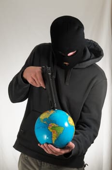 Black Dressed Young Man Holding a Globe Earth