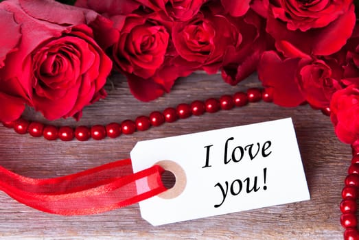 Label with the Word I love you and roses as Background