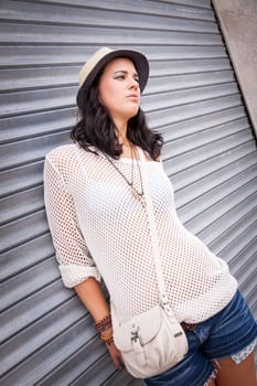 Young woman with hat in summer casual fashion lifestyle leisure portrait