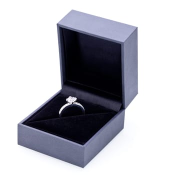 Beautiful modern elegant silver jewelry ring in a noble jewelry box box detail macro