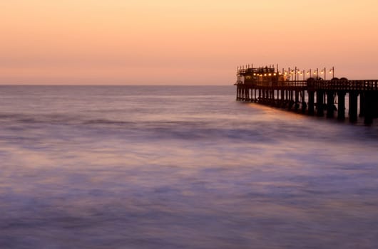 Famous jetty in Swakopmund, a germam style colonial city on the Atlantic coast of northwestern Namibia