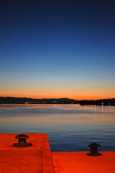 Mole at the harbour at sunrise