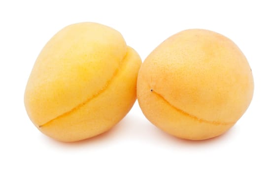 Fresh sweet apricots isolated on white background