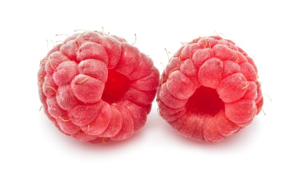 Ripe red raspberries isolated on white background