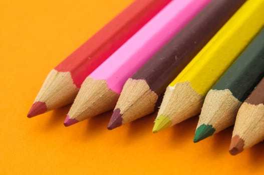 New Pencils Textured Set on a Colored Background