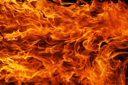 Beautiful yellow and orange hot fire on black background