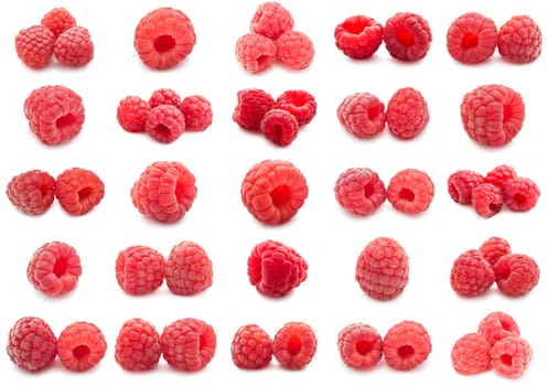 Collection of ripe red raspberries isolated on white background