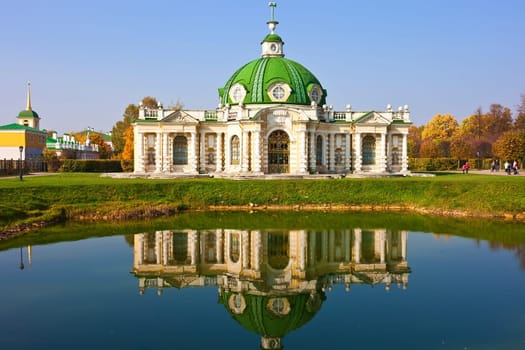 Grotto pavilion with beautiful reflection in park Kuskovo, Moscow, Russia