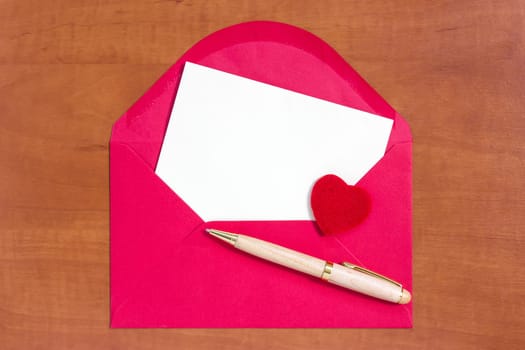 Red envelope with little heart and letter for your own text