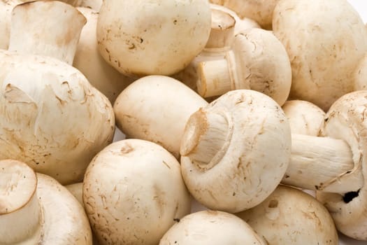 Champignon mushrooms making raw food pattern background