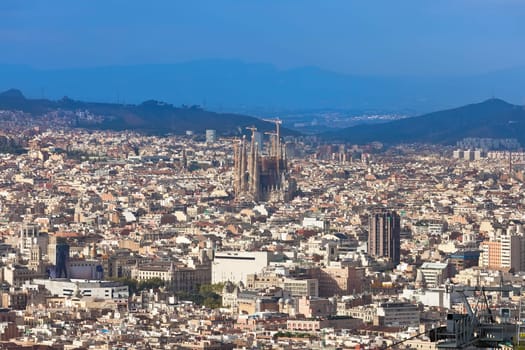 Panoramic view of Barcelona cityscape with Sagrada Familia