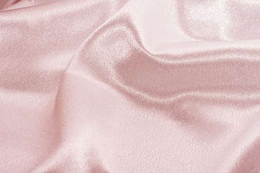Background pink silk fabric with beautiful waves