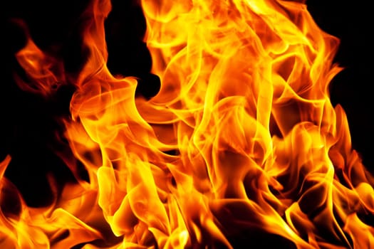 Beautiful yellow and orange hot fire on black background