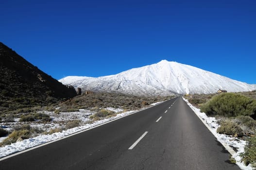 Snow Desert Lonely Road Landscape in Volcan Teide National Park, Tenerife, Canary Island, Spain