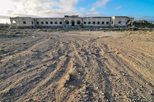 Abandoned Buildings of a Military Base at Sunset