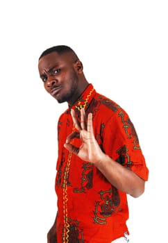 A handsome young black man in a colorful makes a sign it is all ok.. for white background..