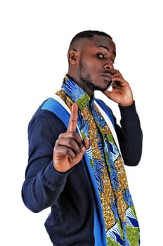 A handsome young black man in a colorful shirt talking on a cell phone.for white background..