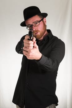 Black Dressed Young Man Holding a Pistol Gun